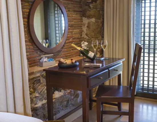 Rooms with stone walls and historical details